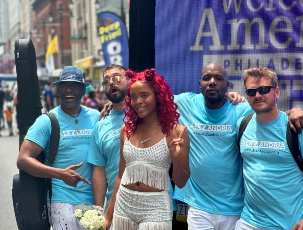 AlxZandria with her band on the street in Philadelphia